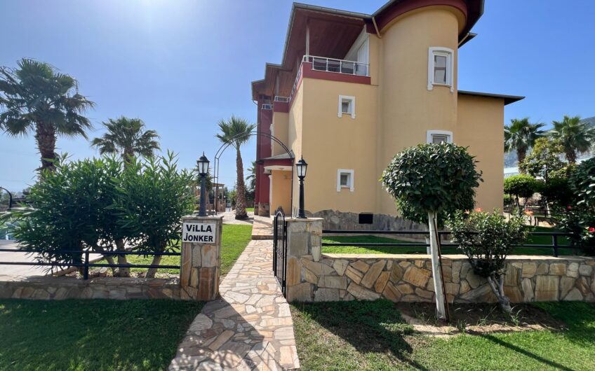 Detached villa with private pool within the site