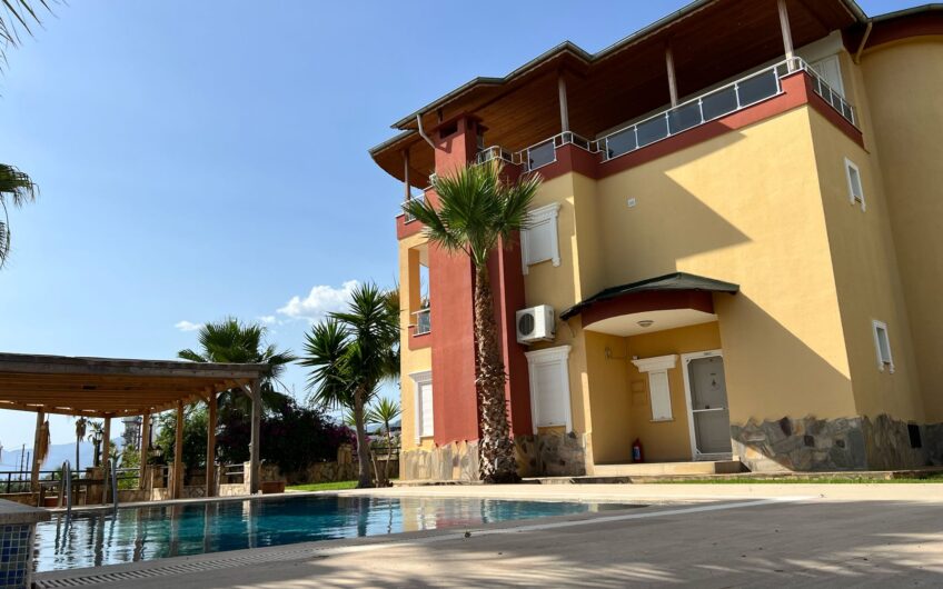 Detached villa with private pool within the site