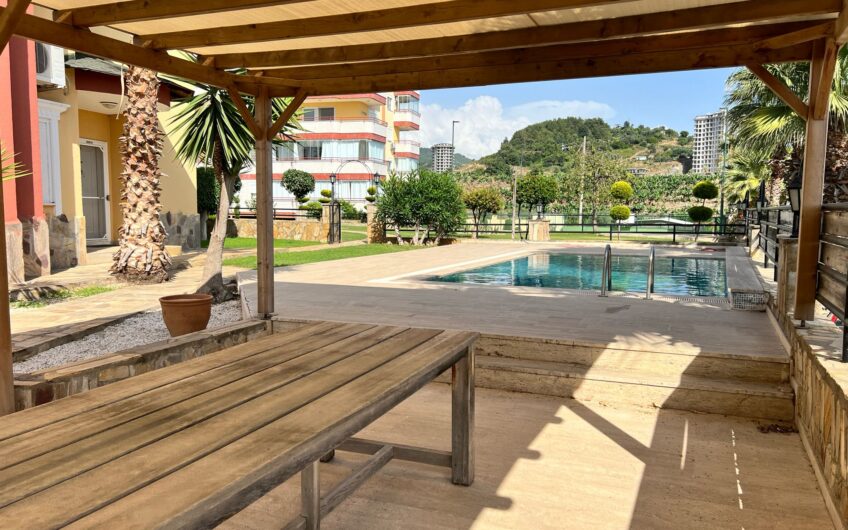 Detached villa with private pool within the site
