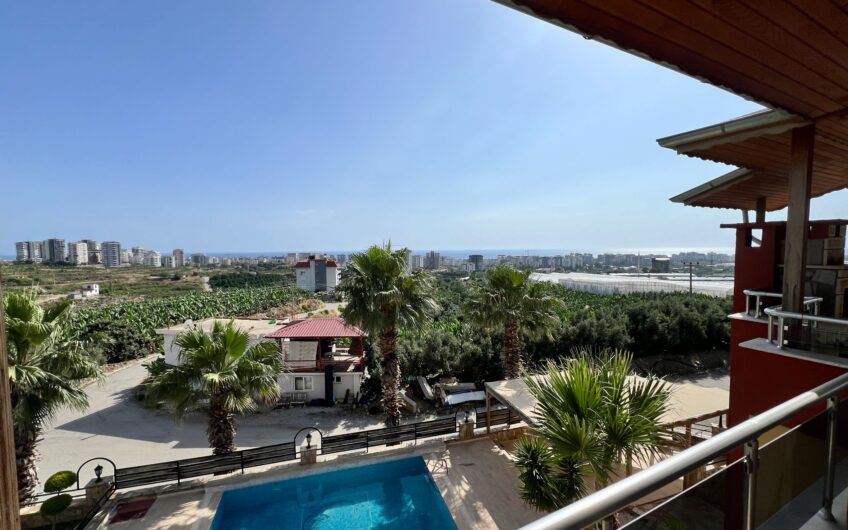 Detached villa with private pool within the site