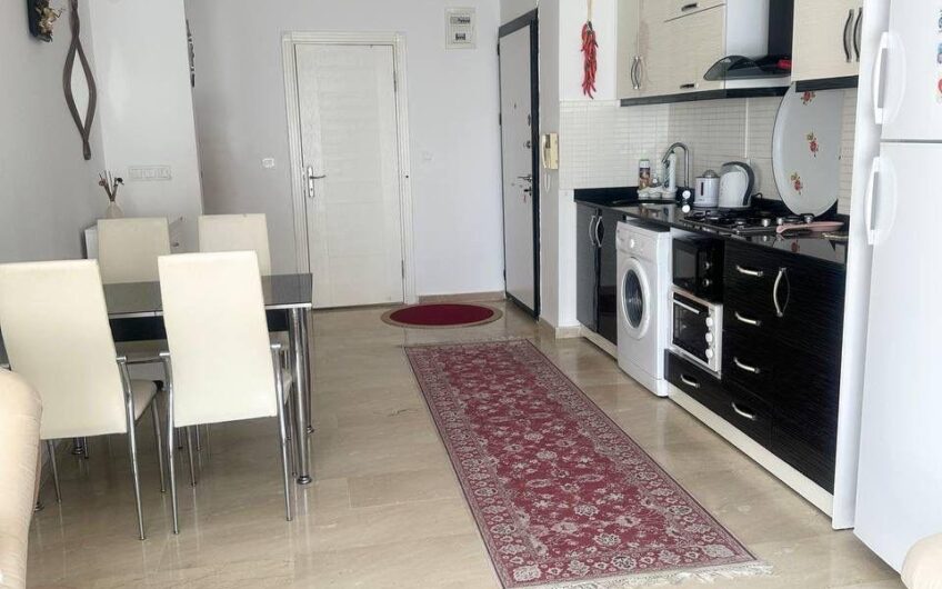 Alanya, Mahmutlar — furnished 2+1 apartment in a residential complex with a swimming pool.