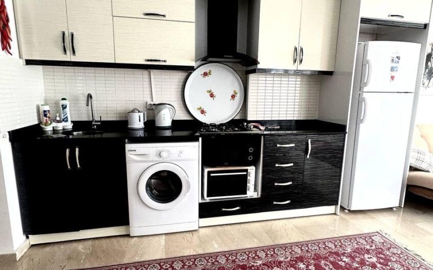 Alanya, Mahmutlar — furnished 2+1 apartment in a residential complex with a swimming pool.
